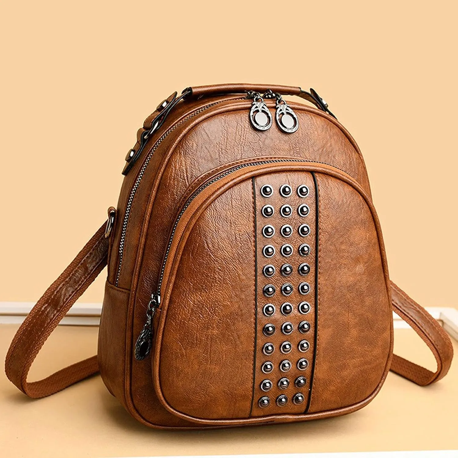 Functional and stylish women's multi-compartment small leather backpack. (Beige)